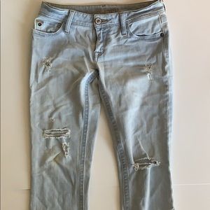 DL1961 distressed light wash skinny jeans